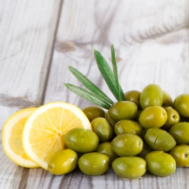 زيتون اخضر بالليمون والفلفل - عبوة زجاجية 1.5 كيلو